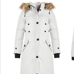 Canada Weather Gear women’s parka. Long to mid length and so covert warm.